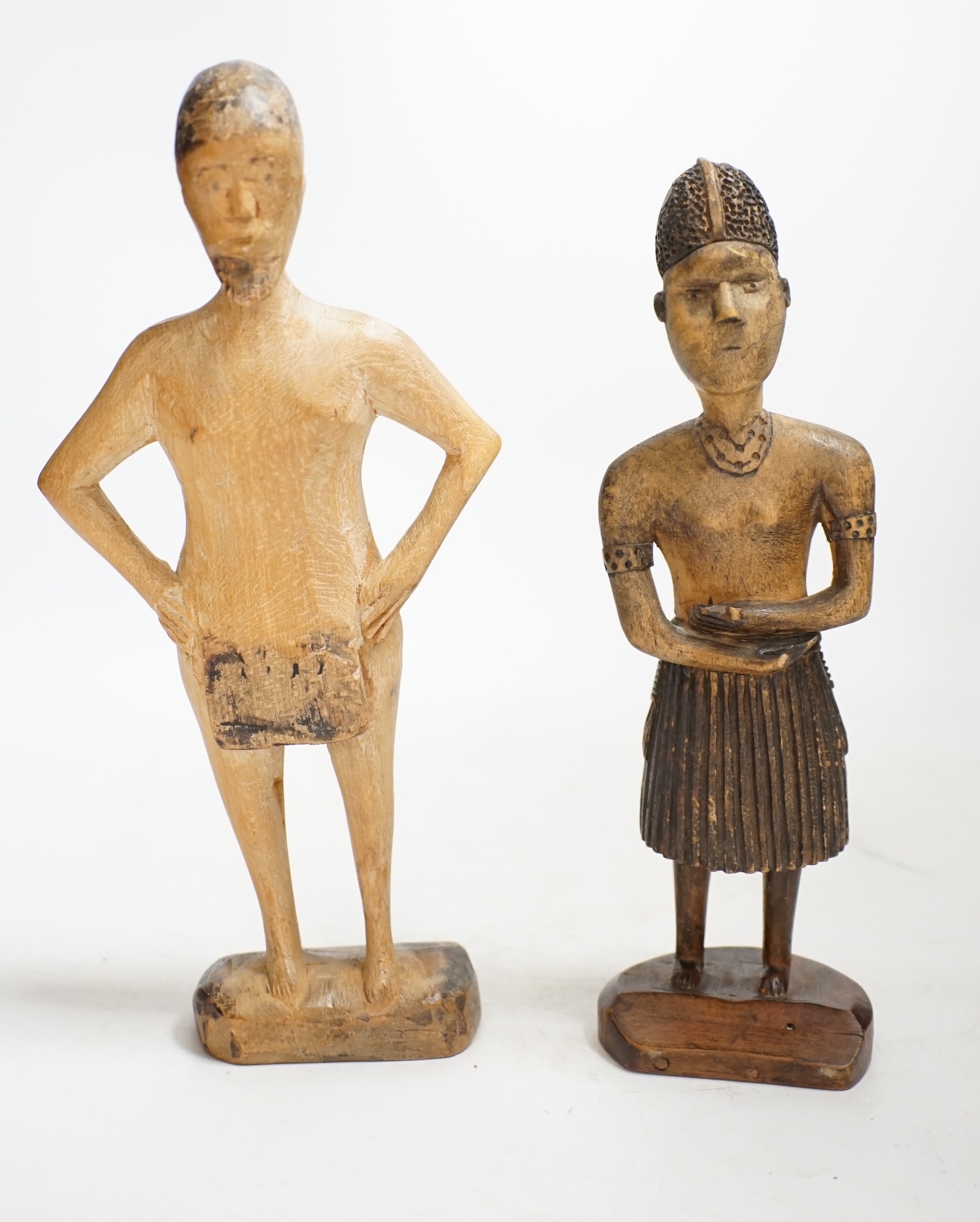 Two African carved wood figures, Akan people and probably Fanti, tallest 27cm. Condition - fair to good.